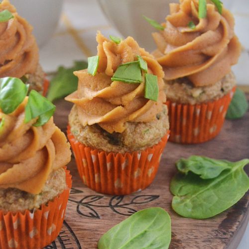 Homemade dog treat recipe for Spinach Apple Pupcakes With Peanut Butter Cream Frosting