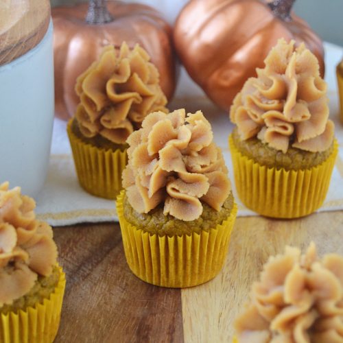 Halloween homemade dog treat recipe for Pumpkin Pupcakes With Peanut Butter Cream Frosting